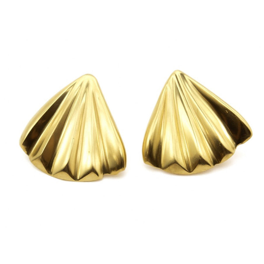 Pair of gold shell-shaped earrings on a white background